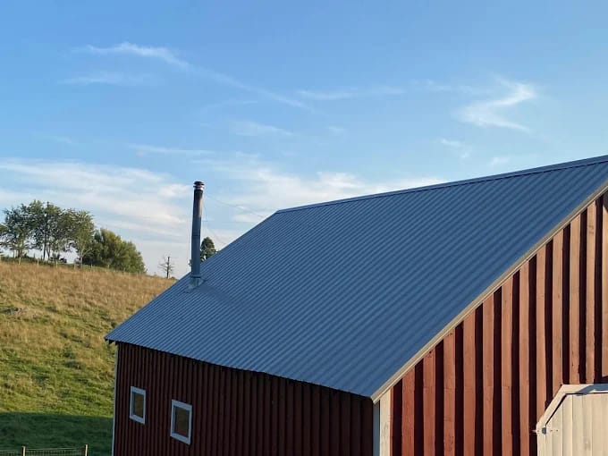 Blue metal roof on an agricultural barn