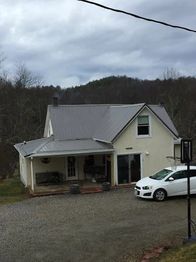 Farmhouse with a metal roof