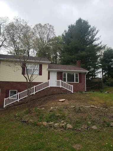 Brick house during a residential roof renovation