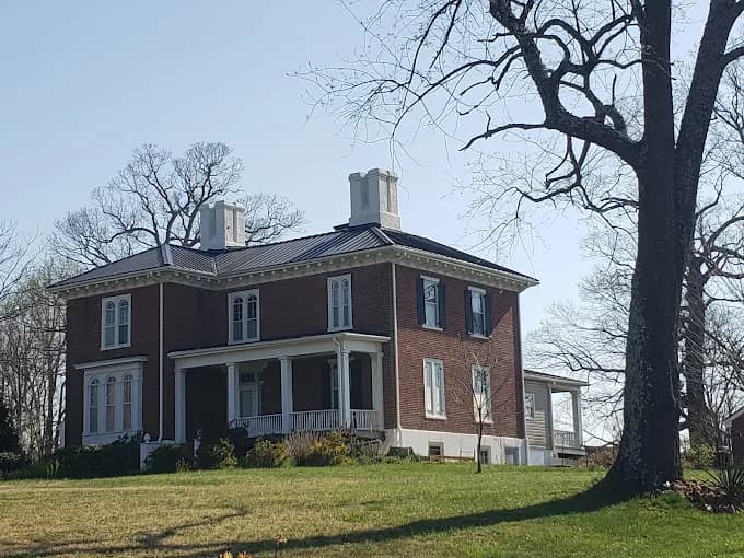 Historic brick house with a metal roof